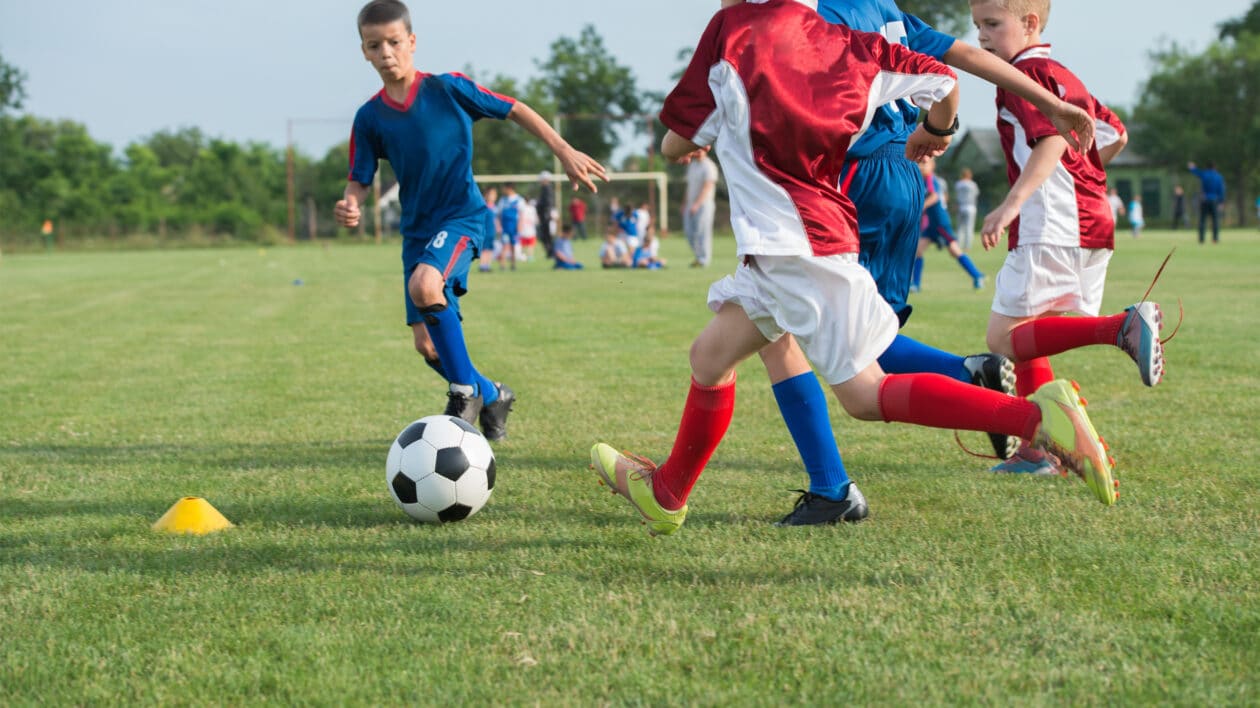 Children playing football