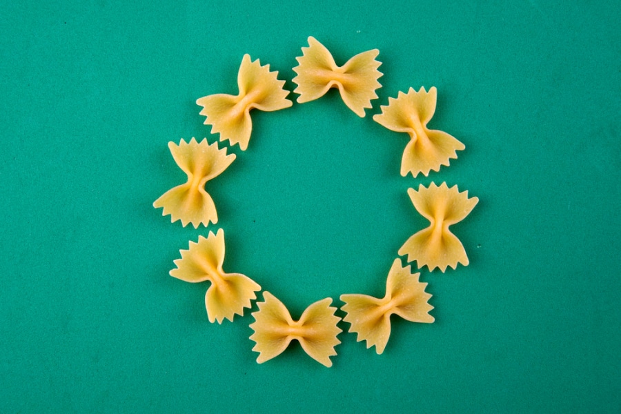a christmas wreath card made out of pasta