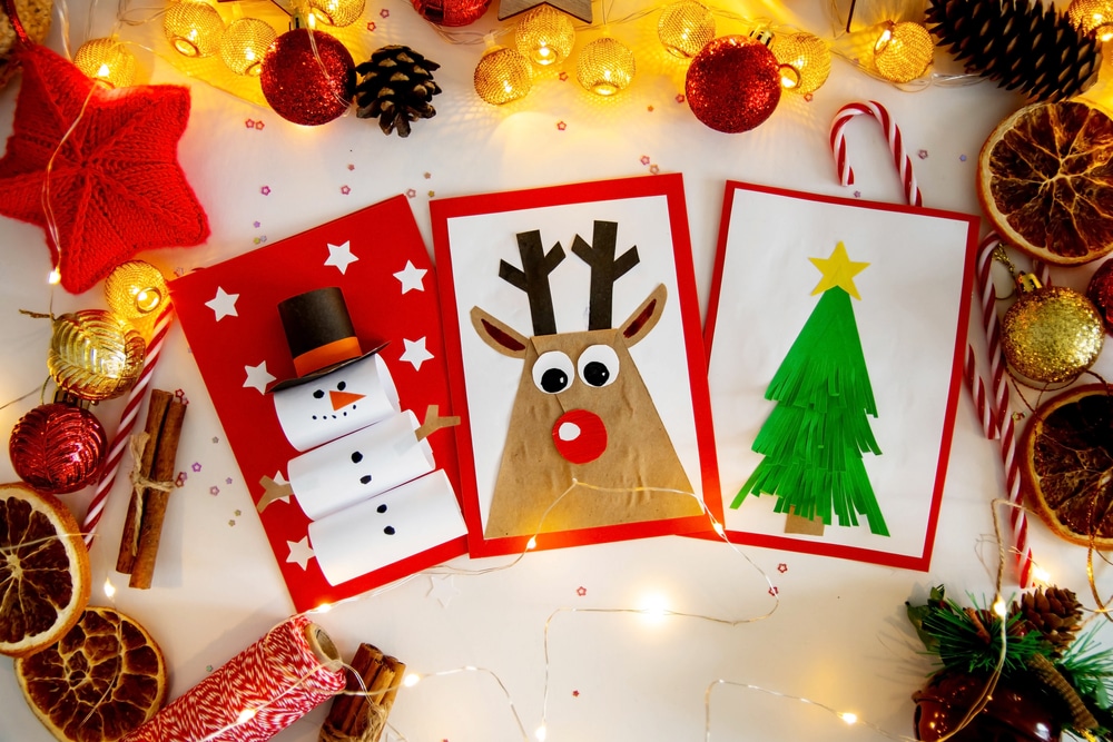 a snowman, reindeer and christmas tree cards