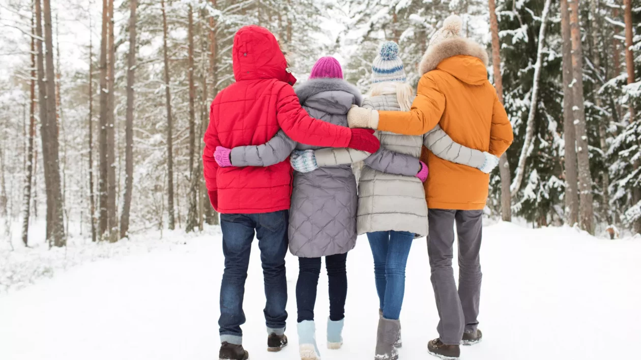 a family walking together in the snow