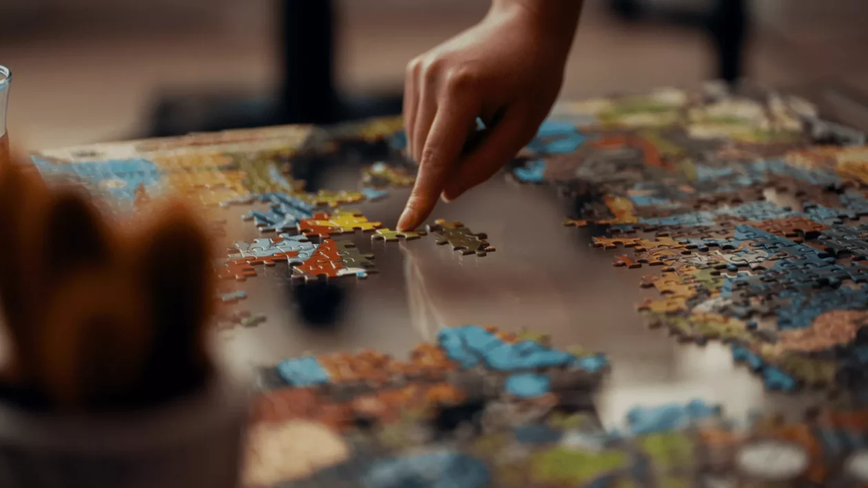 someone playing with a jigsaw