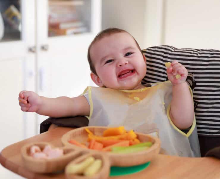 baby eating by themselves