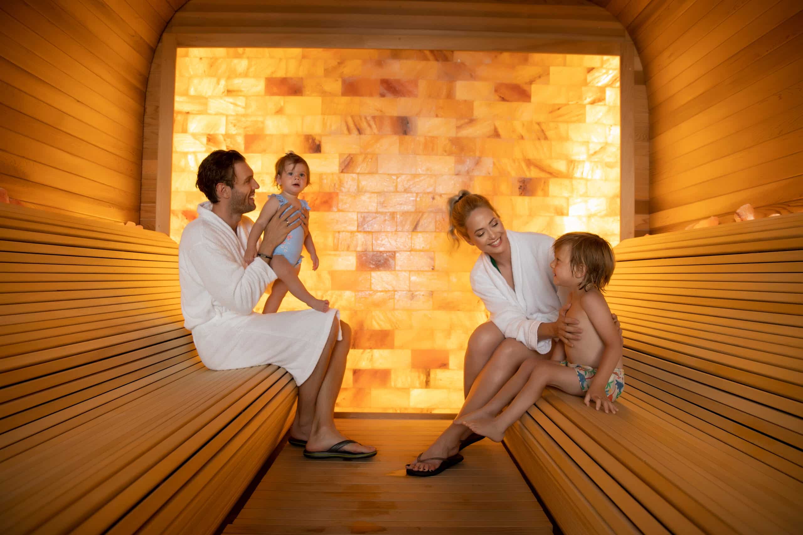 Happy,Family,Relaxing,In,The,Salt,Room family enjoying spa