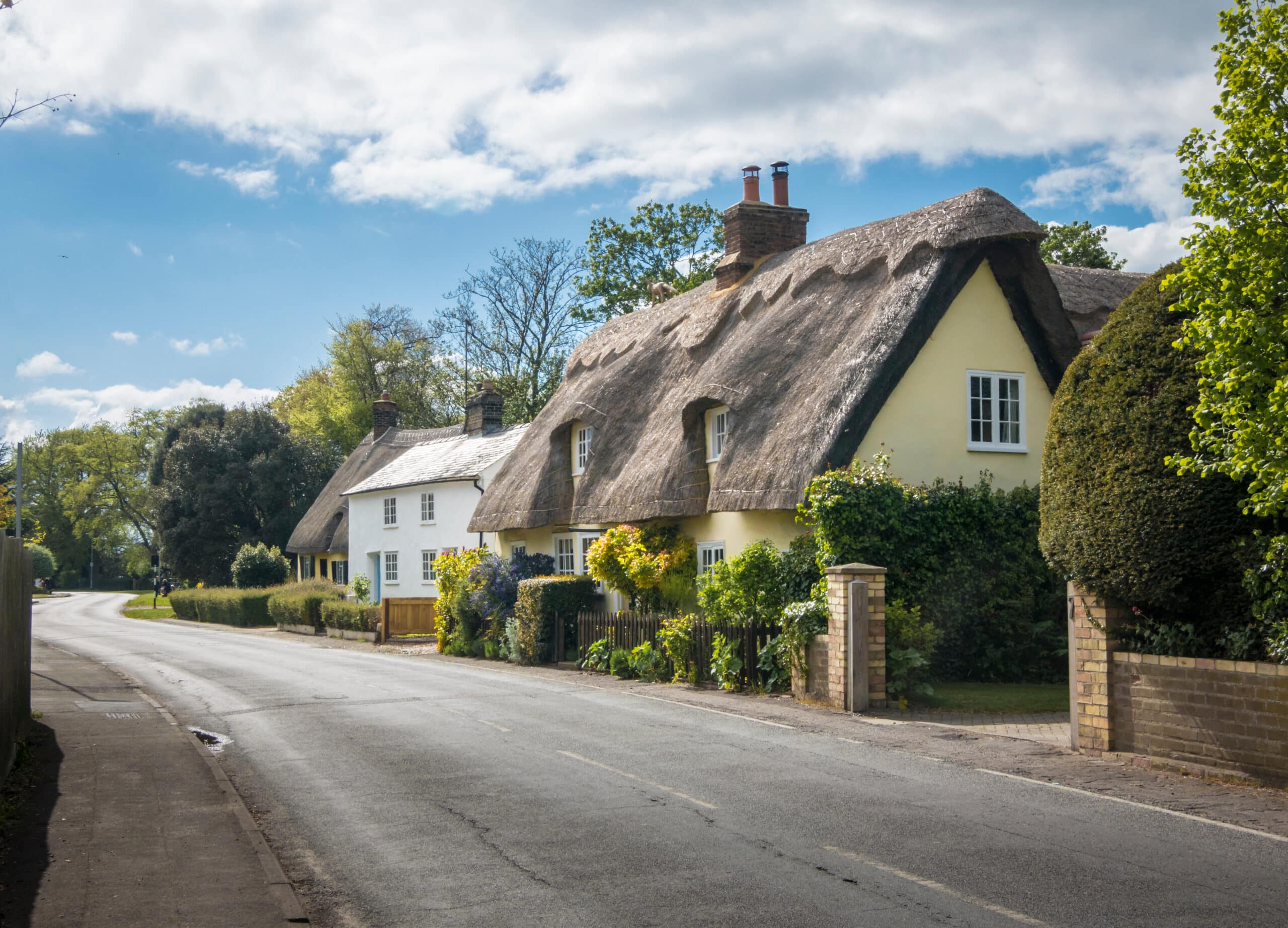 Street,View,Of,Old,Thatched,Cottages,In,The,Pretty,Village Cottage in Devon