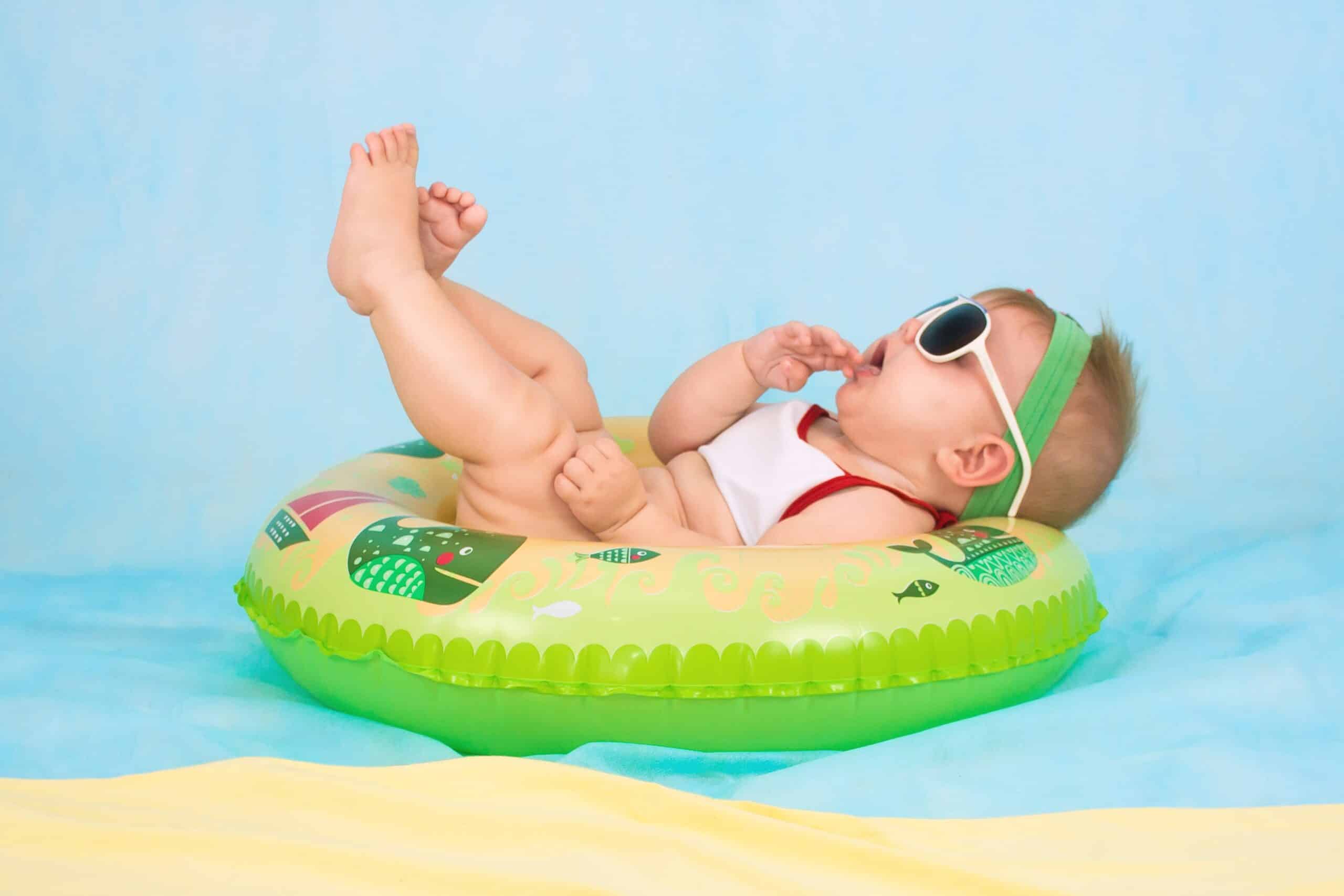 Baby girl in pool floaty