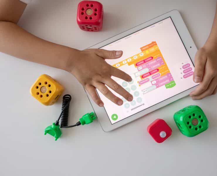 child playing on tablet