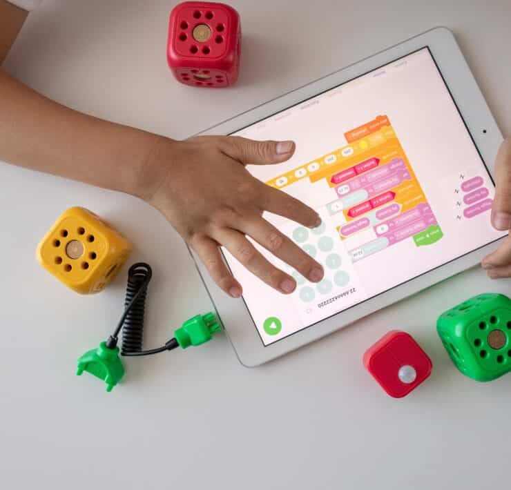 child playing on tablet