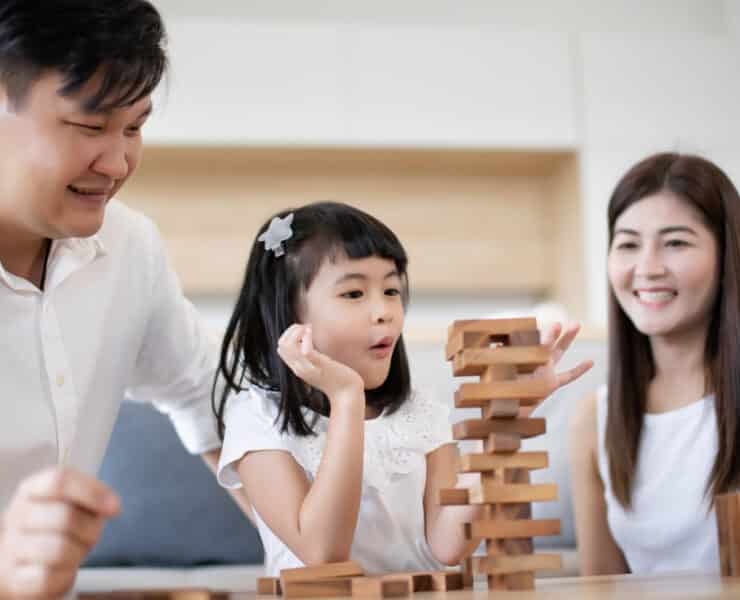 family playing board games