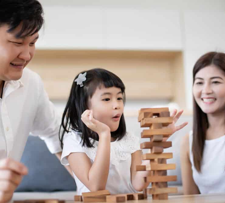 family playing board games