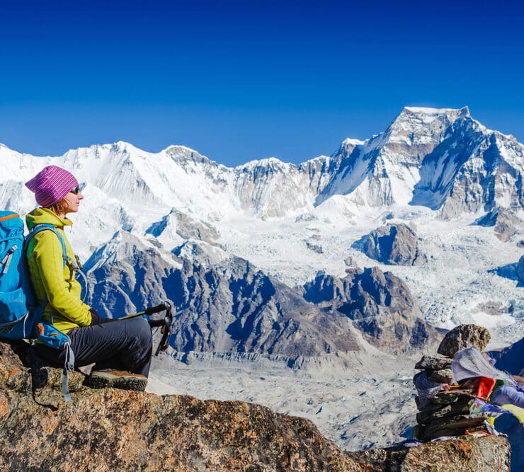 climber at the top of mount everest