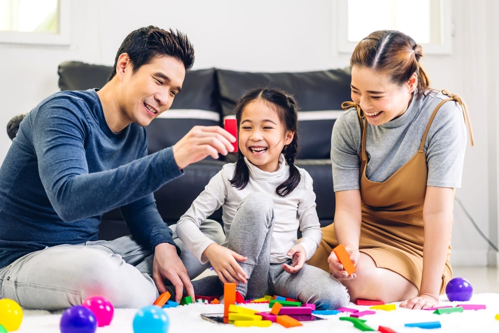 family playing board games