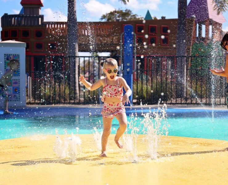girl playing with water