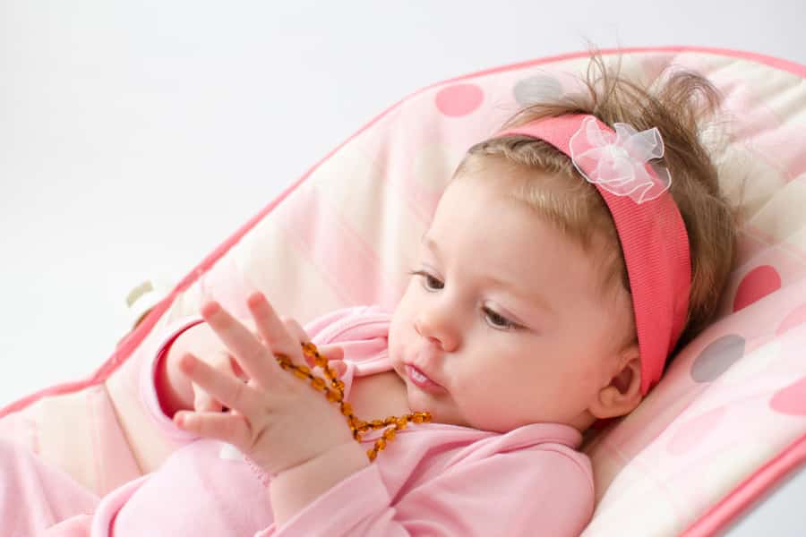 baby with teething bracelet