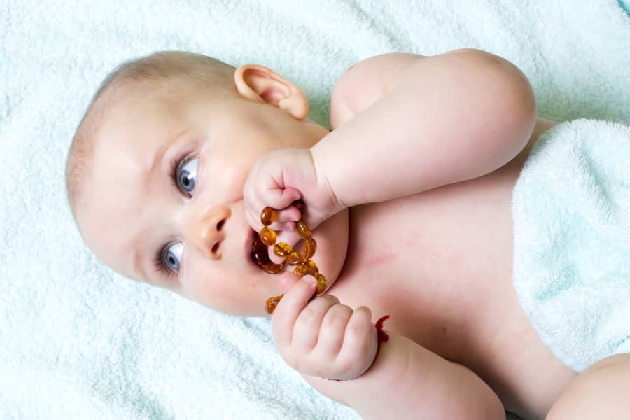 baby with teething bracelet