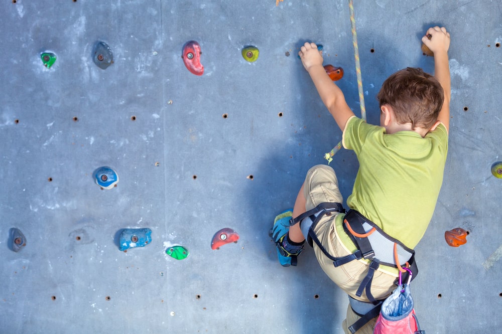 little boy climbing