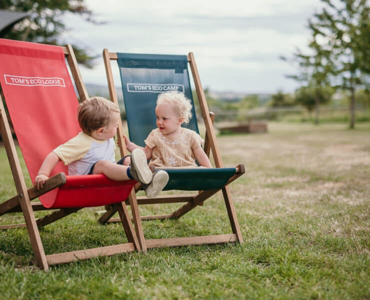 toddlers on deck chairs