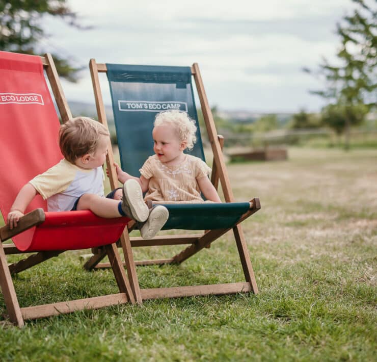 toddlers on deck chairs