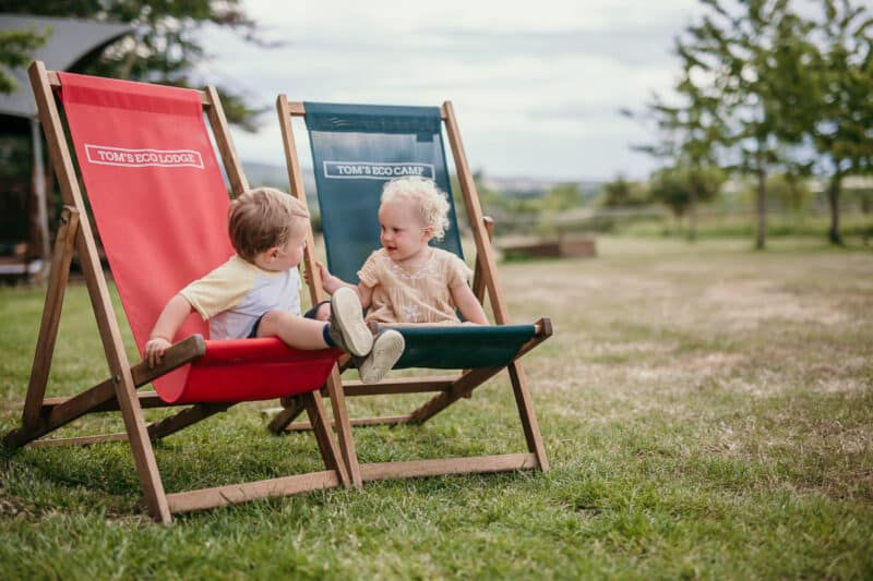 toddlers on deck chairs