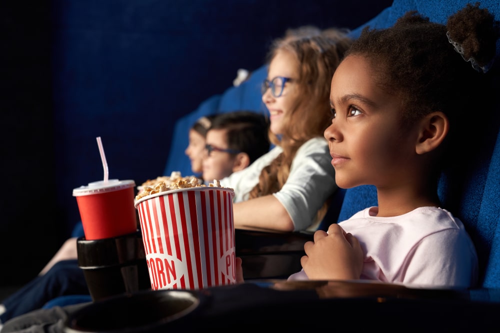 kids watching a film in the cinema