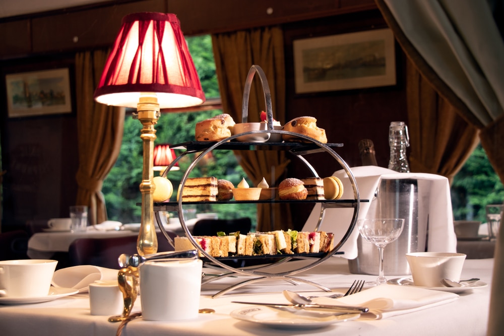 picture of afternoon tea with cakes on a steam train