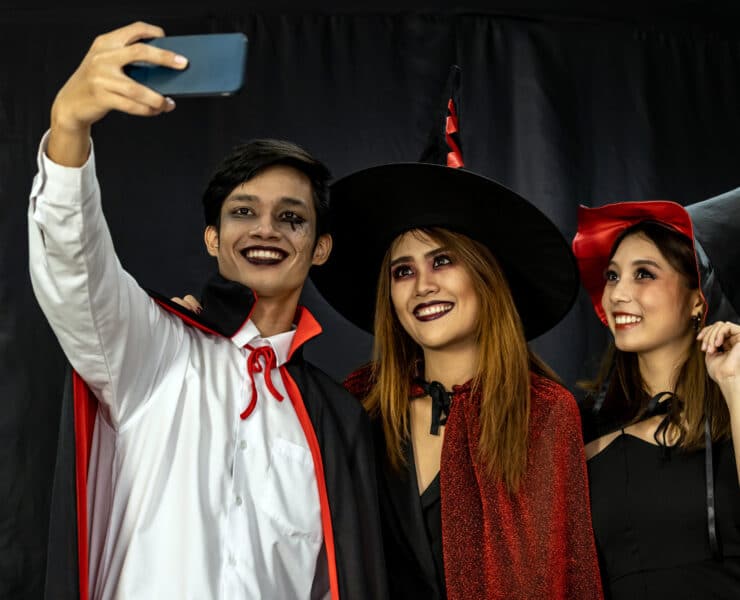 Teenagers at Halloween party