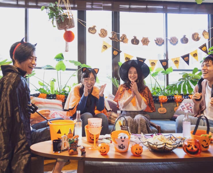 friends altogether enjoying halloween games