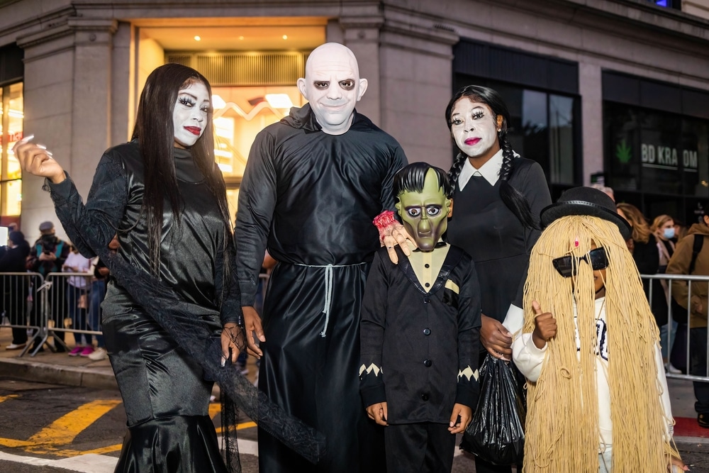 family dressed up as the addams family