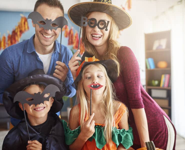 a family dressed up for halloween