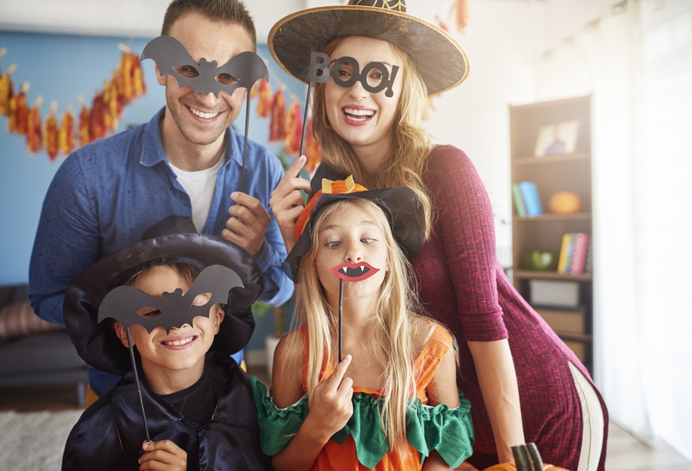 a family dressed up for halloween