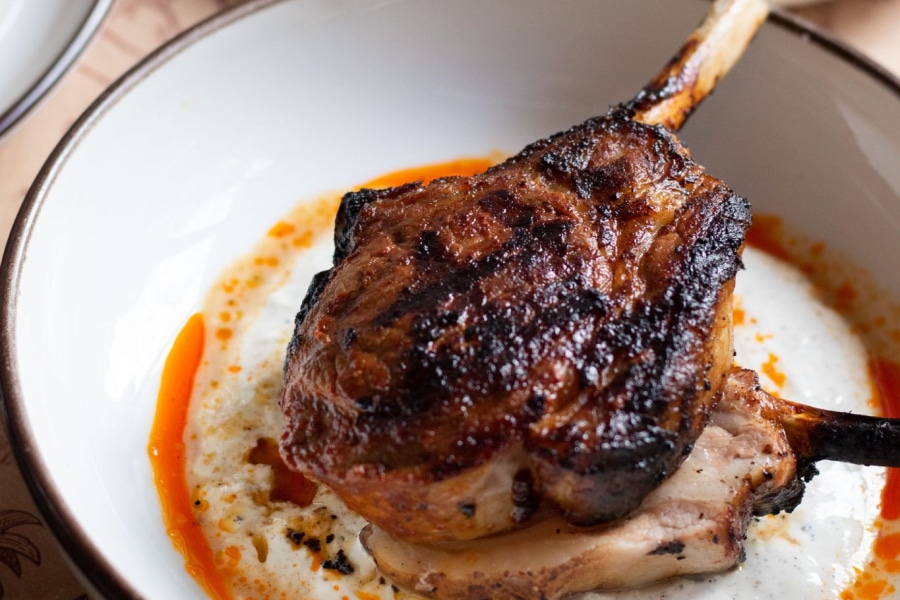 a piece of succulent rib on a bed of mash