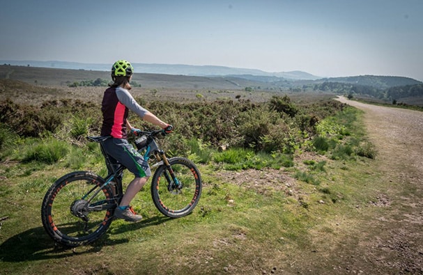 man cycling on a bank in devon