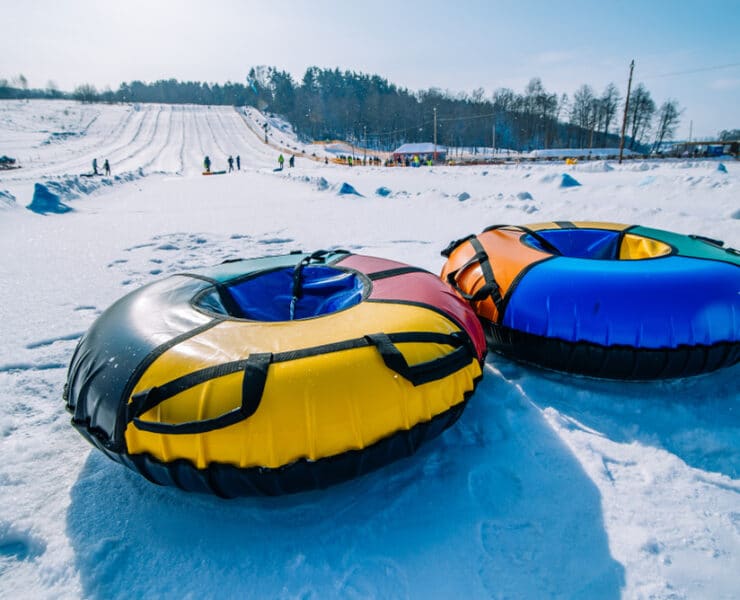 snow tubing on a snowy slope