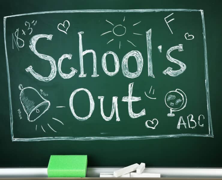 schools out written on a chalkboard