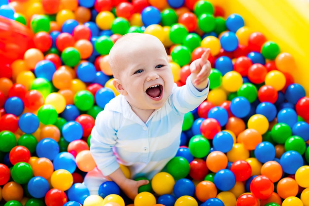 kid in ball pit
