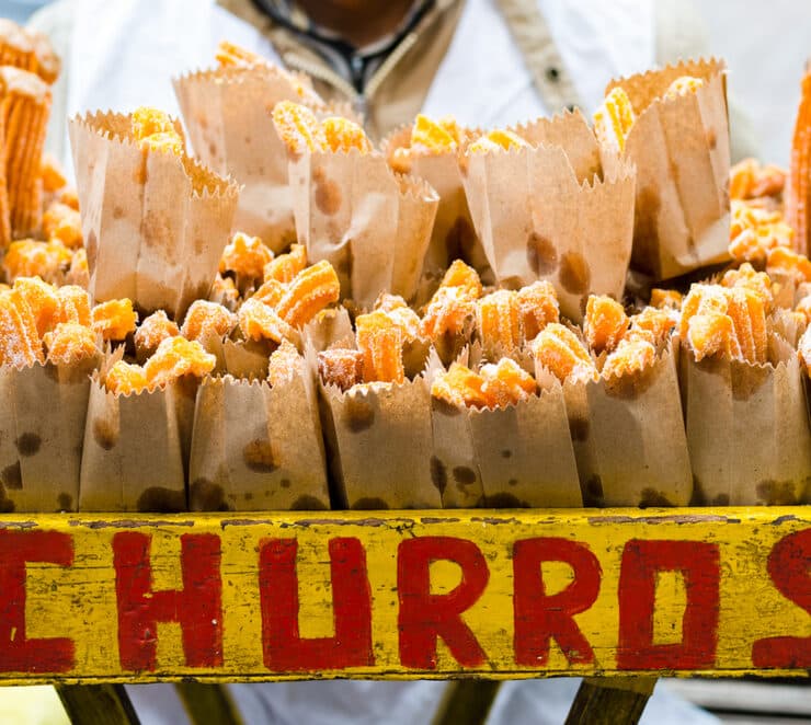 a market stall selling churros