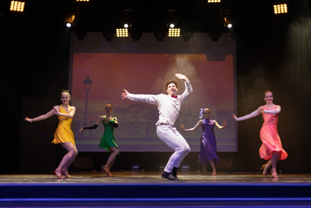 People performing in theatre