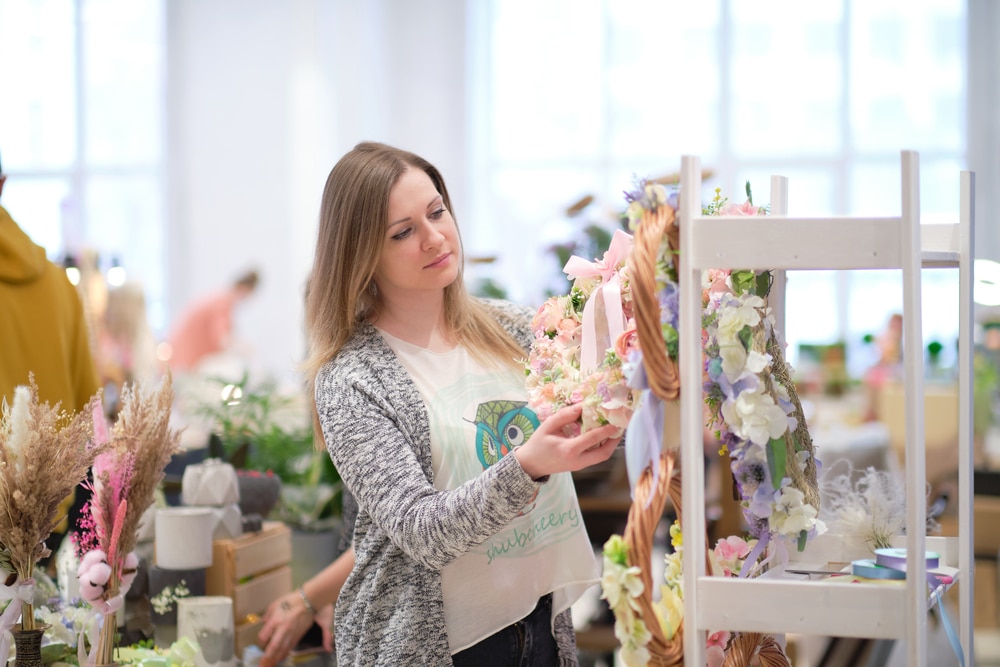 woman looking at craft fair