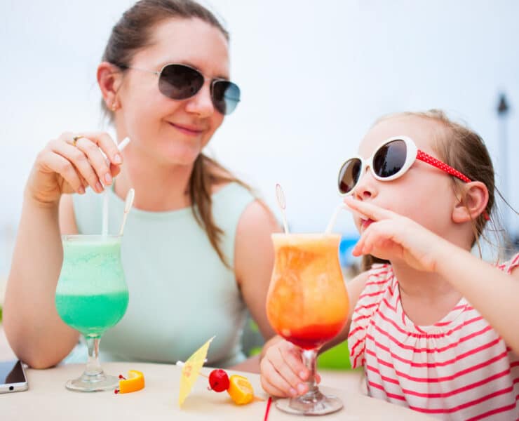 Mother and daughter drinking mocktails