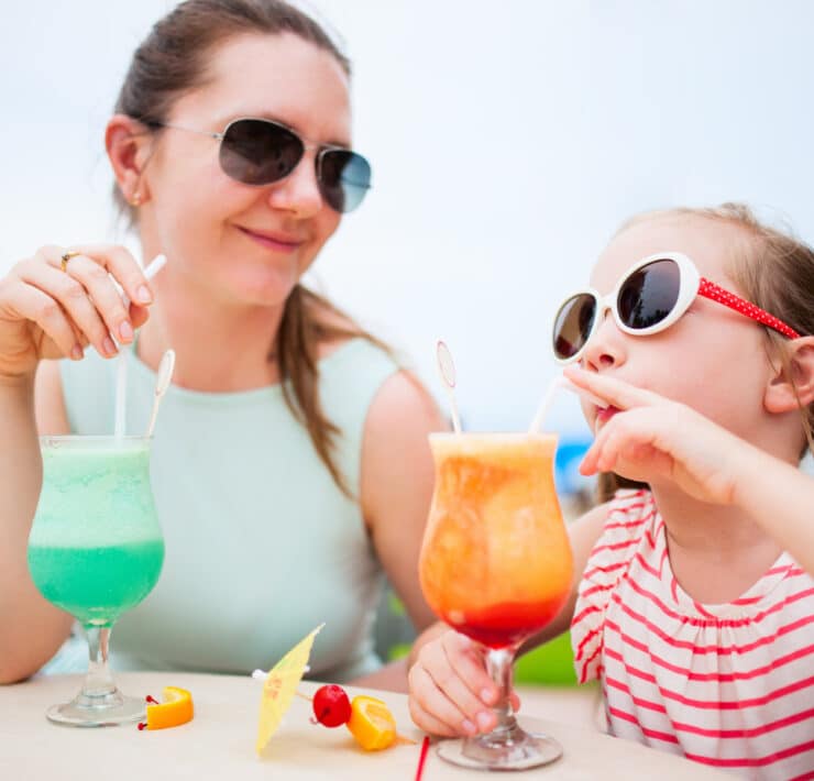 Mother and daughter drinking mocktails