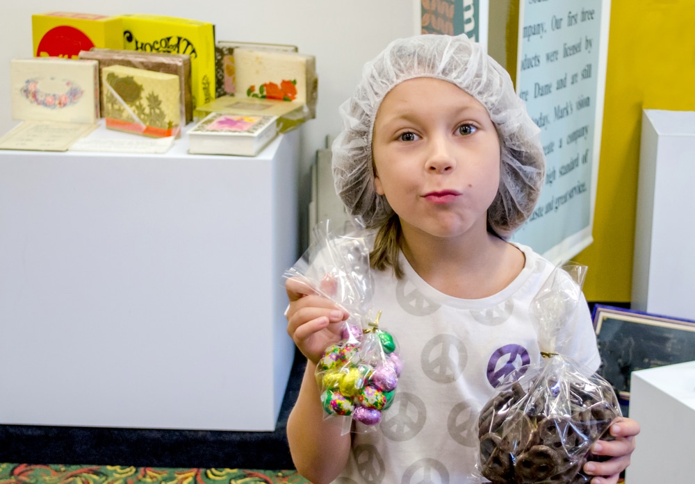 kid holding chocolate