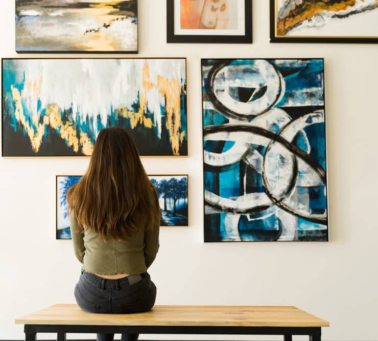 somone looking at an art gallery