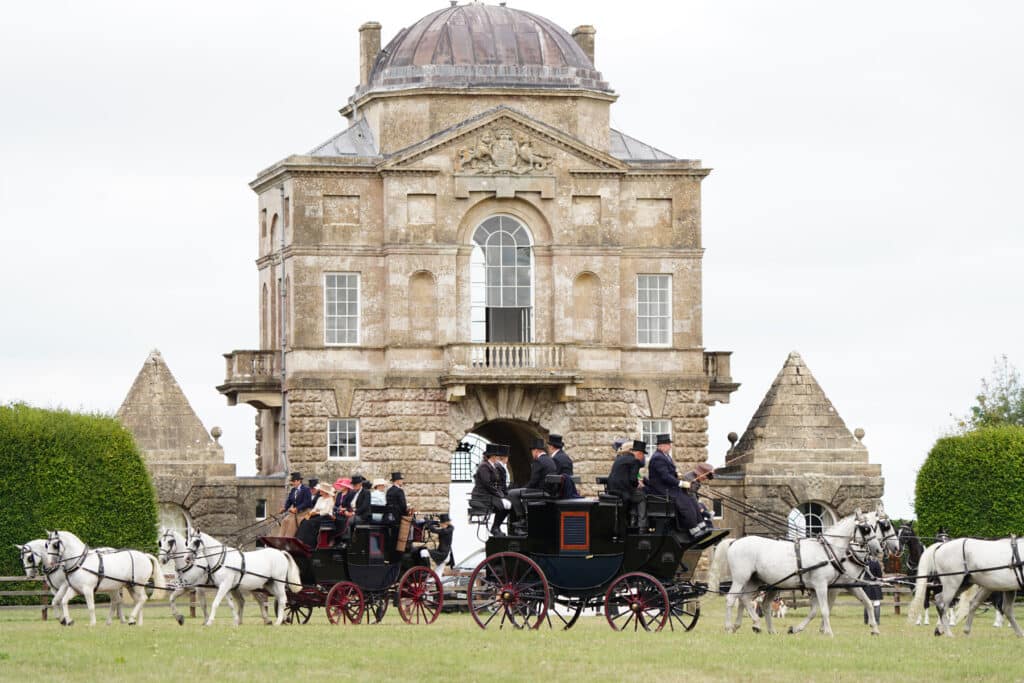 horse driven carriages on badminton house grounds