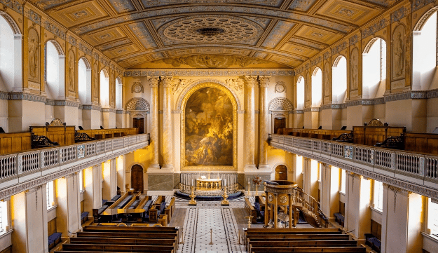 the inside of the old royal navy college with paintings