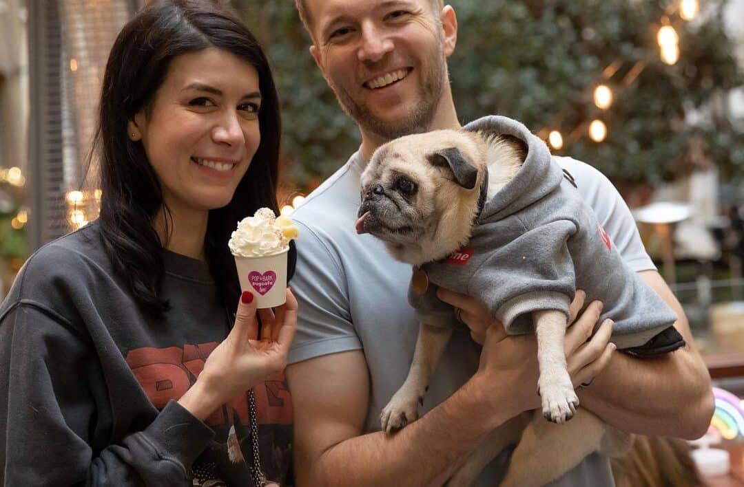 pug with his owners