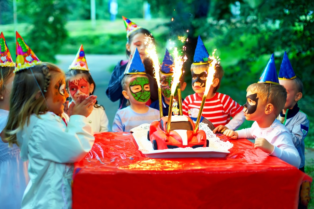 kids with superhero face painting