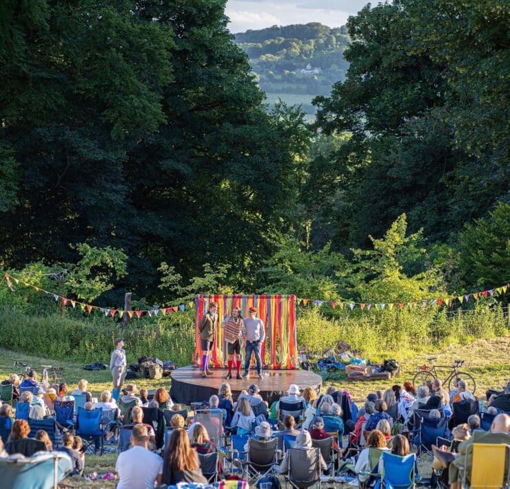 handlebards performing on open air stage