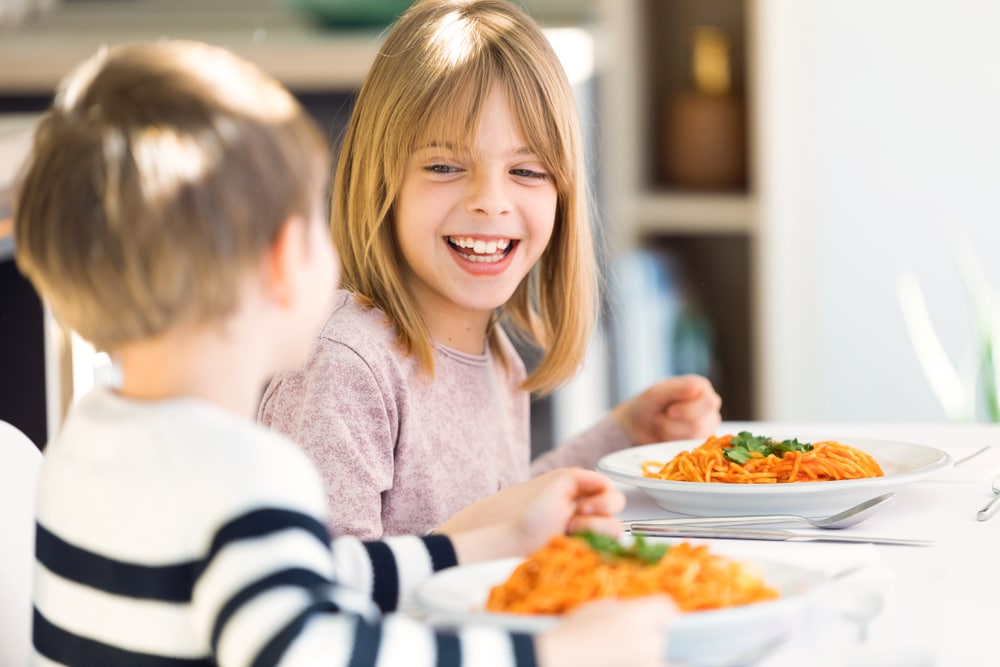 kids eating pasta