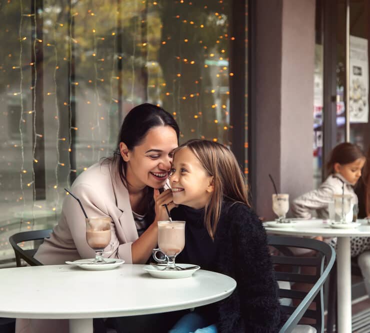 mother and daughter out at a restaurant