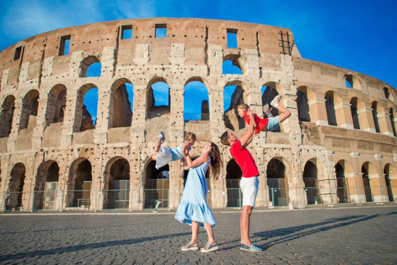 family outside the colosseum in rome