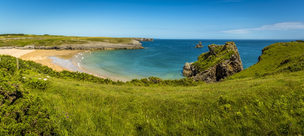 grassy cliffs overlooking the sea at Broad Haven beach